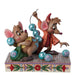 Two animated mouse figurines with colorful balls on a decorative base