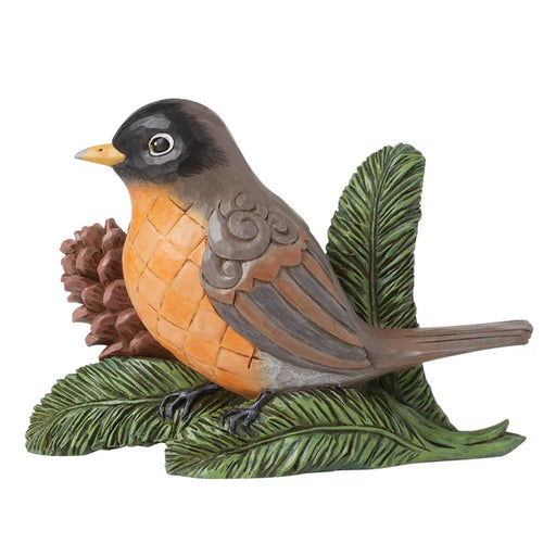 Bird figurine with orange chest, gray back, and black head on a white background