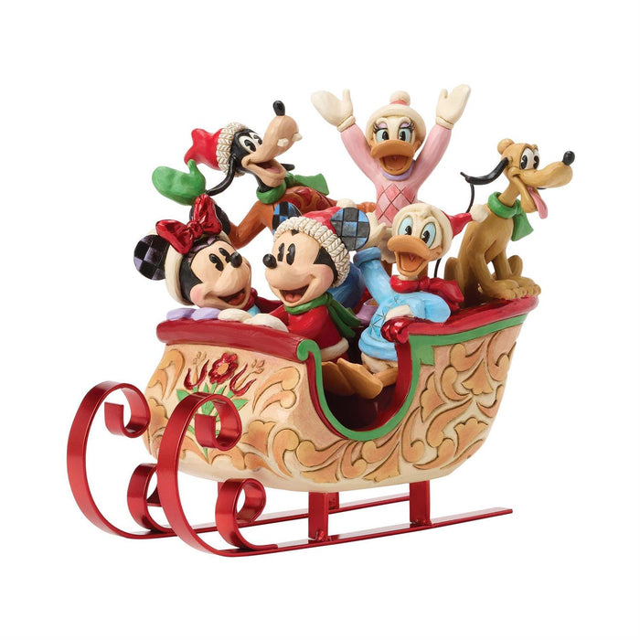 Animated characters in a sleigh with Christmas decorations on a white background