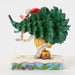 Figurine of Winnie the Pooh and Piglet with Christmas tree on a white background