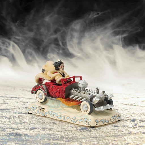 Decorative figurine of a person in a car with flames, set against a smoky background.