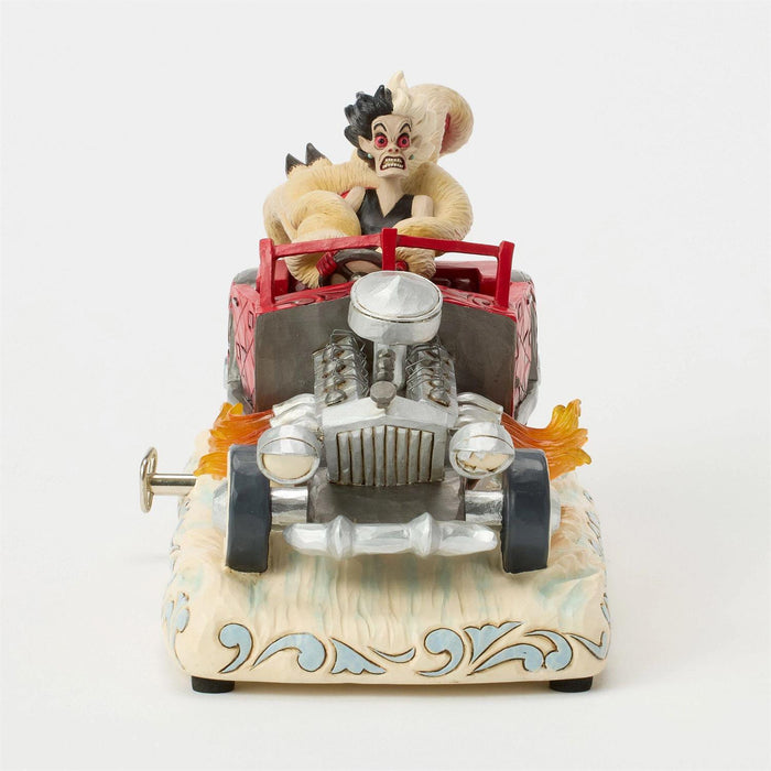 Toy car with a character in a black mask and white outfit sitting on top, on a white background