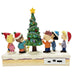 Figurine of children around a Christmas tree with USB charging ports on a white background