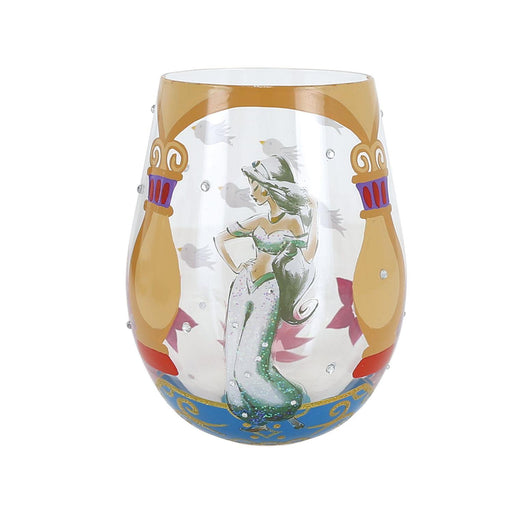Decorative glass with artistic design of a figure on a white background