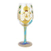 Decorative wine glass with artistic design on a white background