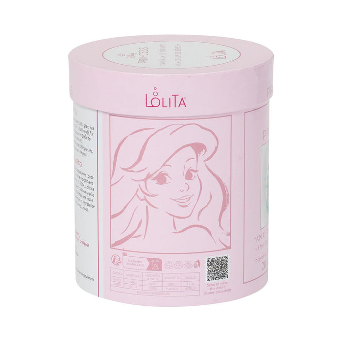 Pink cylindrical container with a face design and 'Lélita' branding on a white background