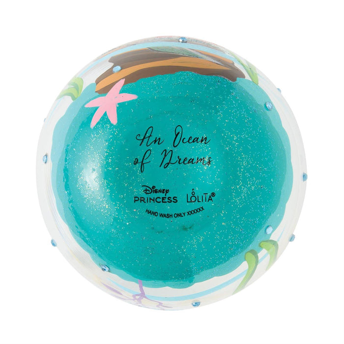 Blue bath bomb with ocean-themed design and 'Disney Princess Lolita' branding on a white background
