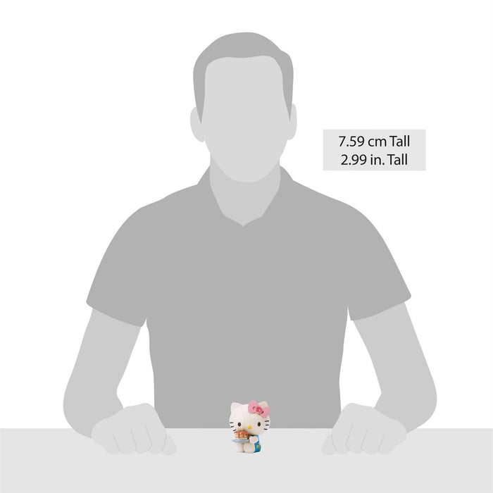Placeholder image with a person wearing a gray shirt and a small Hello Kitty figurine on a white background.