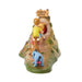 Animated character figurine with a rabbit house on a white background