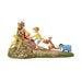 Animated character figurine with a bear, child, and other animals on a white background