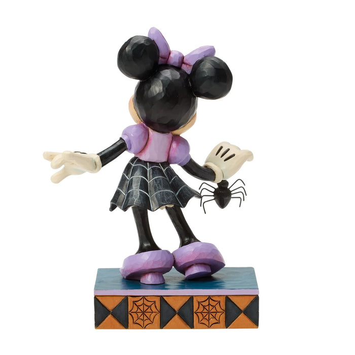 Minnie Mouse Halloween-themed figurine on a white background