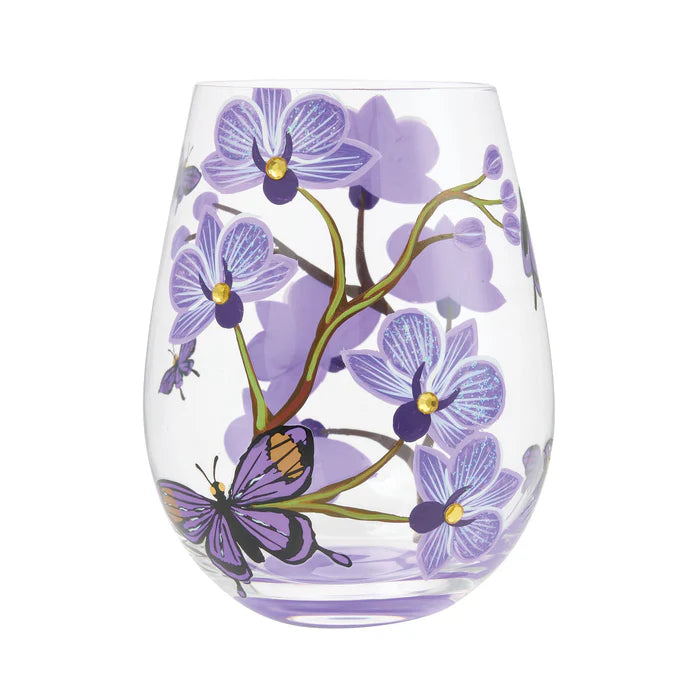 Stemless wine glass with purple floral design on a white background