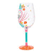 Decorative wine glass with colorful design on a white background