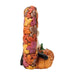 Decorative letter 'L' made of autumn-themed leaves with a small pumpkin on a white background