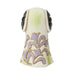 Decorative ceramic dog figurine with intricate designs on a white background