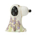 Decorative dog figurine with intricate patterns on a white background