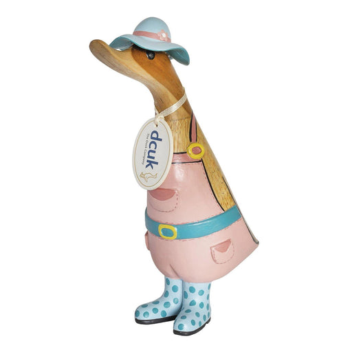 Decorative duck figurine with a hat, boot, and tag on a white background