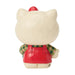 Cat-shaped figurine with a red outfit and plaid shirt on a white background