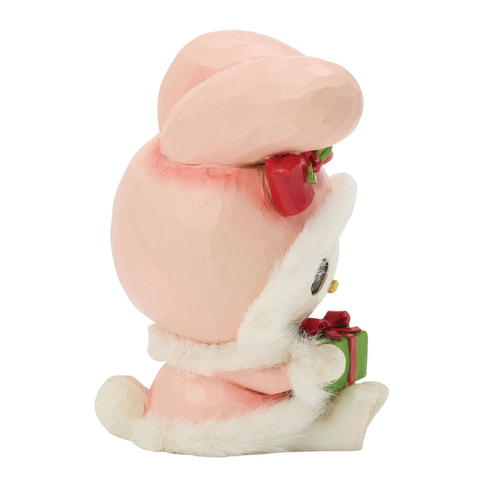 Decorative My Melody figurine with a gift on a white background