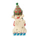 Snoopy figurine with a colorful hat in a red bowl sled on a white background