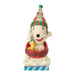 Snoopy figurine with a colorful hat in a red bowl sled on a white background
