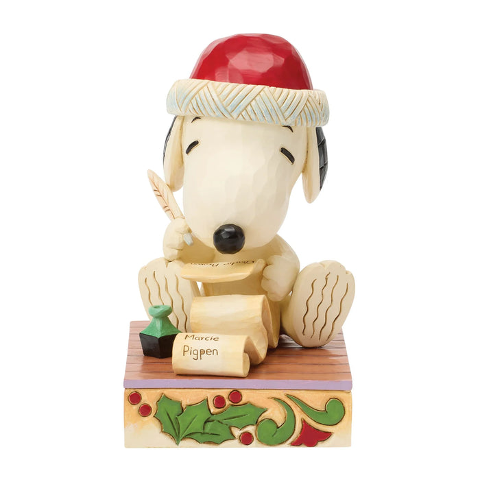 Snoopy figurine with a Santa hat on a white background