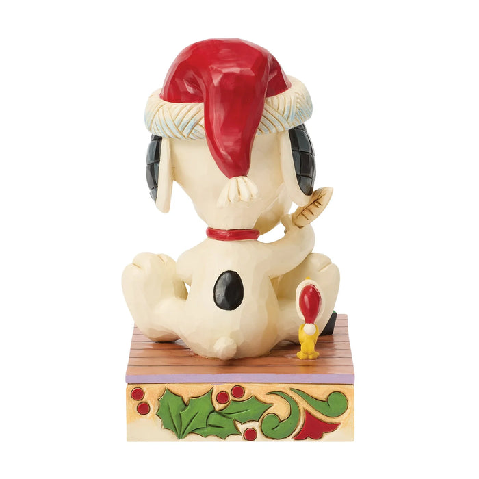Animated character figurine with a red hat on a white background