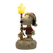 Snoopy figurine holding a star-shaped lamp on a white background