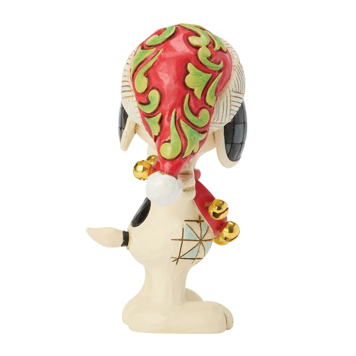 Decorative figurine with a colorful headdress on a white background