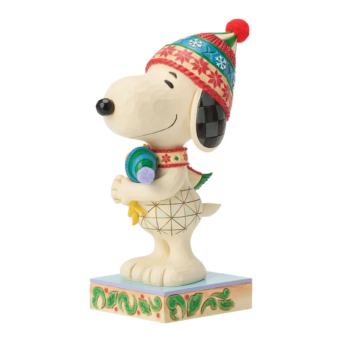 Festive Snoopy and Woodstock hugging figurine
