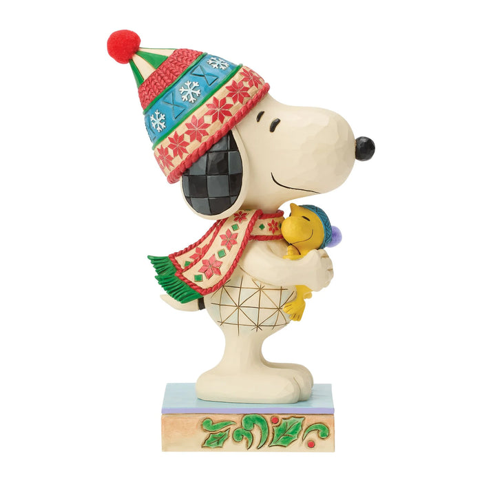 Festive Snoopy and Woodstock hugging figurine
