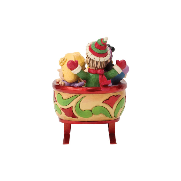 Peanuts characters in a festive sleigh figurine