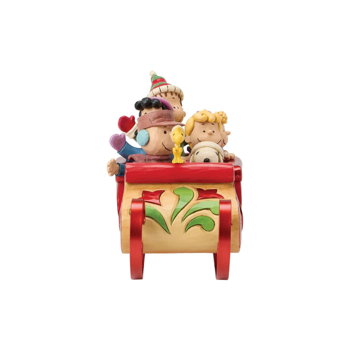 Peanuts characters in a festive sleigh figurine