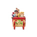Peanuts characters in a festive sleigh figurine