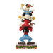 Animated character figurine with colorful outfit on a white background