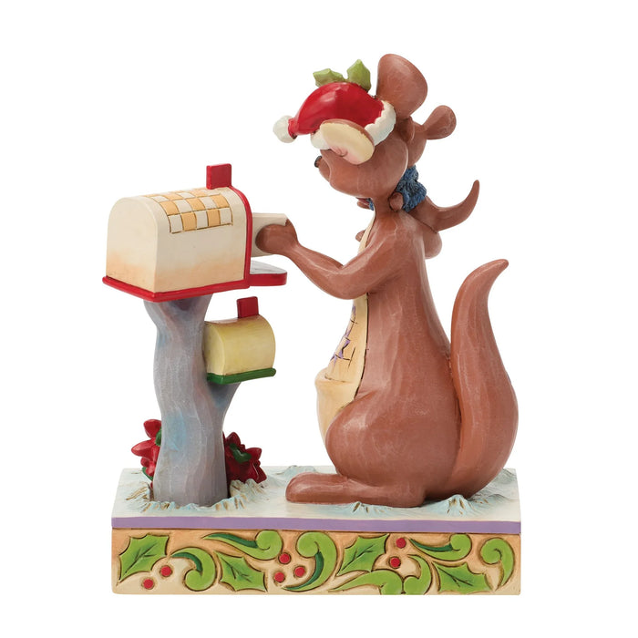 Squirrel figurine with a mailbox on a decorative base