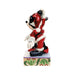 Animated character figurine in a red outfit with white accents on a decorative base.