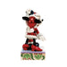 Animated character figurine on a decorative base with a white background