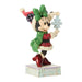 Animated character figurine in festive attire holding a snowflake on a white background