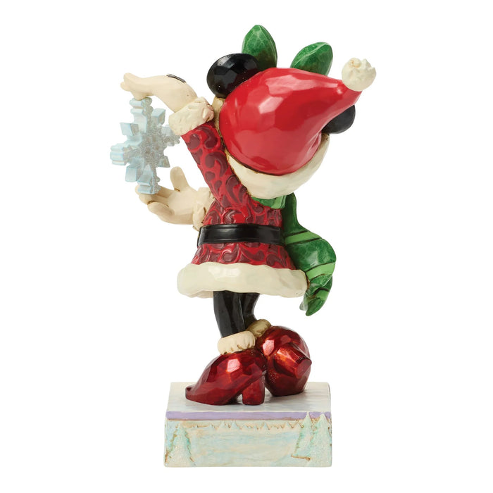 Christmas elf figurine with red hat and boots on a white background