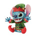 Colorful figurine of a character in elf costume on a white background