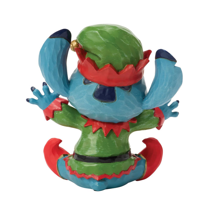 Colorful figurine with blue, green, and red colors on a white background
