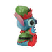 Colorful animated character figurine on a white background