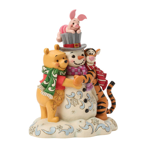 Snowman figurine with Winnie the Pooh, Piglet, and Tigger on a white background