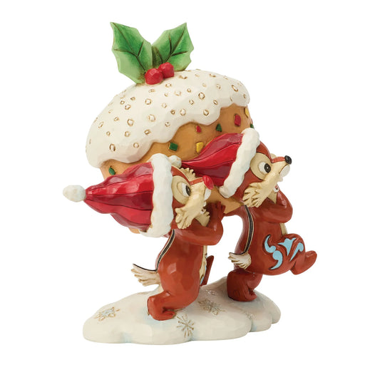 Animated character figurine with a Christmas pudding on a white background