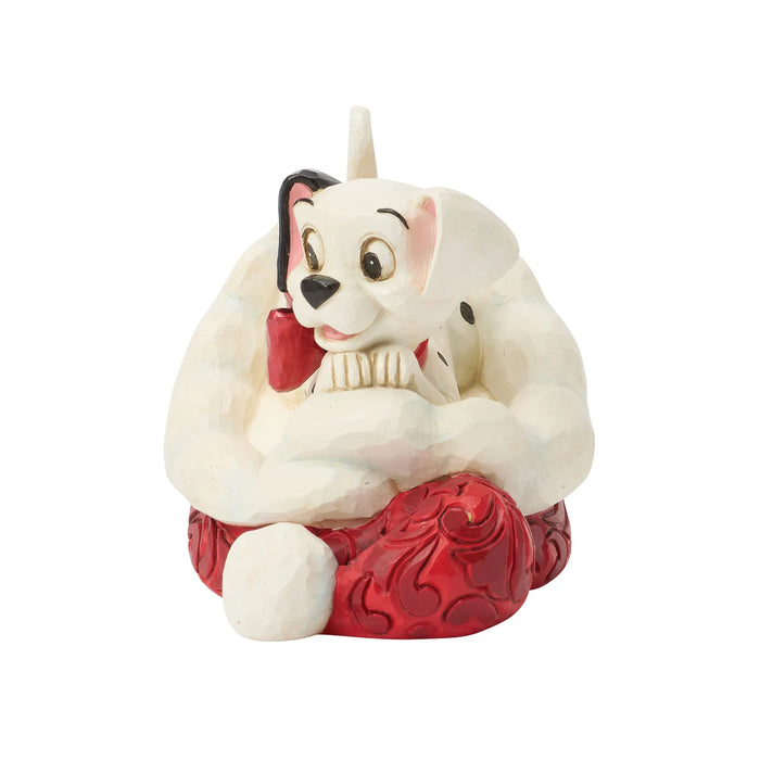 Animated character figurine with a red base on a white background