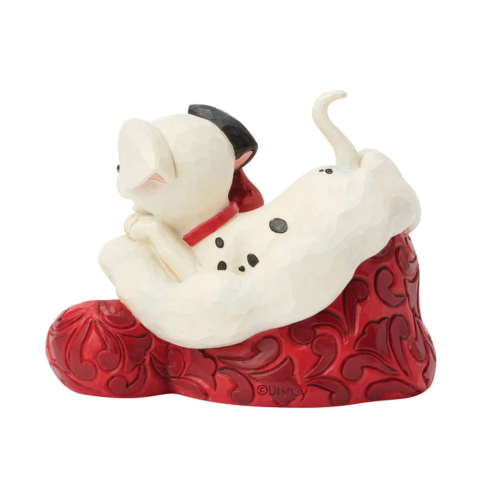 Animated character figurine with a red base on a white background