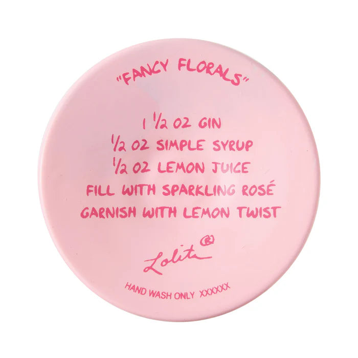 Round pink container with cocktail recipe and brand name on a white background