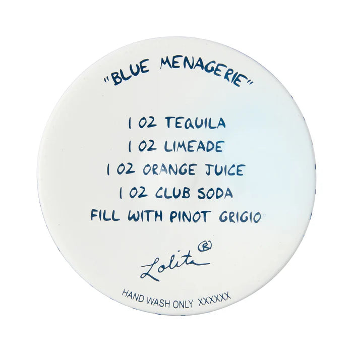 Round white coaster with blue text listing a cocktail recipe and brand name on a white background