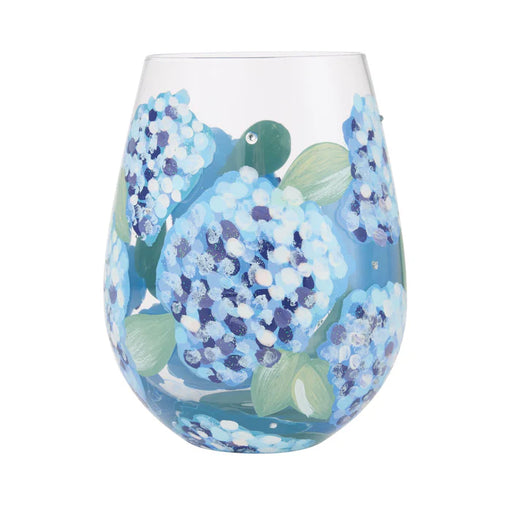 Stemless wine glass with blue floral design on a white background